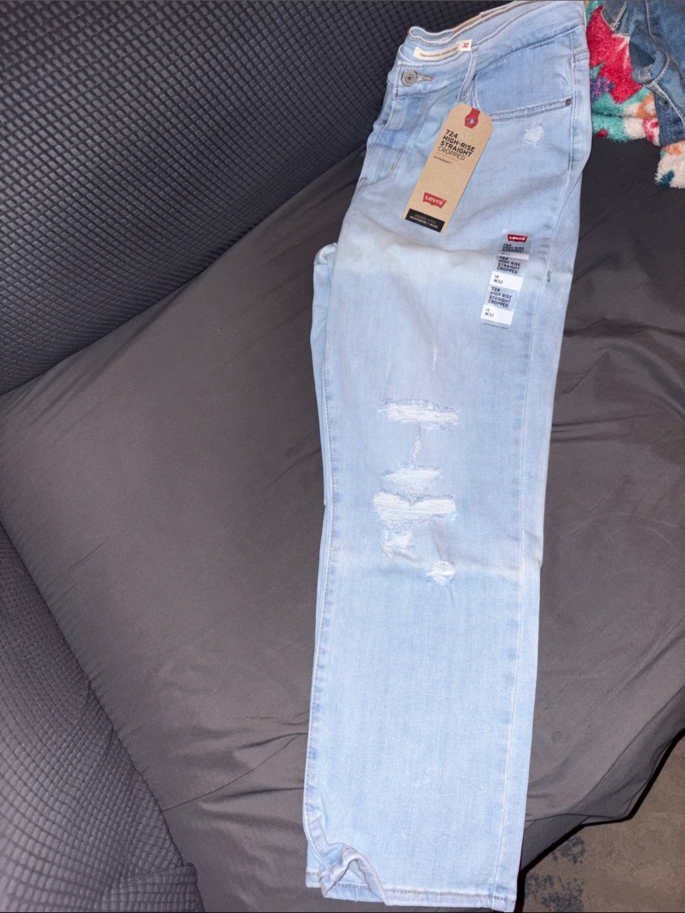 Levi's 724 high rise straight cropped jeans. Size 32. With ripped details
